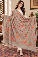 Close-up of Aari work on a beige shawl