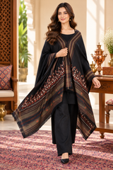 Detailed view of Aari embroidery on a black wool shawl