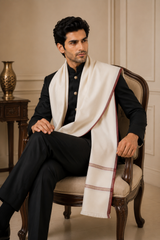 Cream colour men’s woven shawl with elegant border, worn with black traditional suit