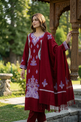 Model wearing maroon Kashmiri woollen unstitched salwar kameez with embroidery and stole