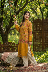 Mustard Kashmiri embroidered woolen kurti worn by a woman