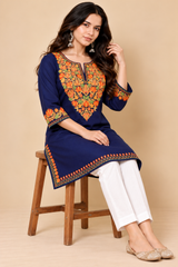 Navy blue short kurti with matching embroidered sleeve cuffs and hem border