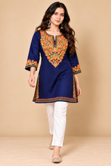 Multicolour embroidered neckline on a navy blue Kashmiri winter kurti