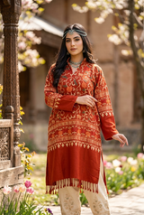 Red Kashmiri embroidered woolen kurti worn by a woman
