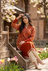 Red woolen kurti with traditional Kashmiri embroidery worn by a model