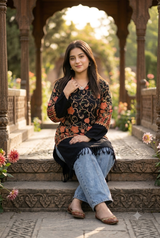 Black woolen kurti with traditional Kashmiri embroidery worn by a model