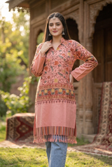 Pink Kashmiri embroidered woolen kurti worn by a woman