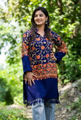  Blue Kashmiri embroidered woolen kurti worn by a woman